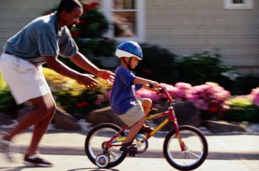 Photograph of a pedestrian and a cyclist.